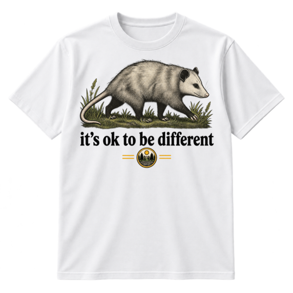 Vintage line-art opossum walking through grass above the text “it’s ok to be different,” with a National Geographic logo beneath.