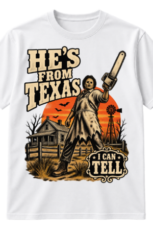 Vintage horror graphic with the words “HE'S FROM TEXAS I CAN TELL,” a masked chainsaw-wielding figure, farmhouse, windmill, bats, and distressed western lettering.