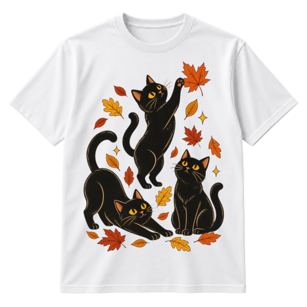 Vintage-style illustration of three playful black cats surrounded by scattered autumn leaves and a small sparkle.