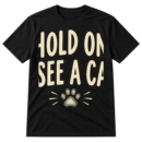 Handwritten text reading “HOLD ON. I SEE A CAT.” with a small sketched paw print underneath.