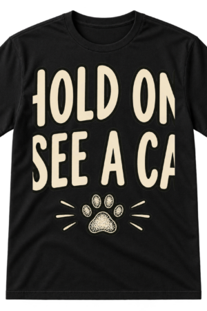 Handwritten text reading “HOLD ON. I SEE A CAT.” with a small sketched paw print underneath.